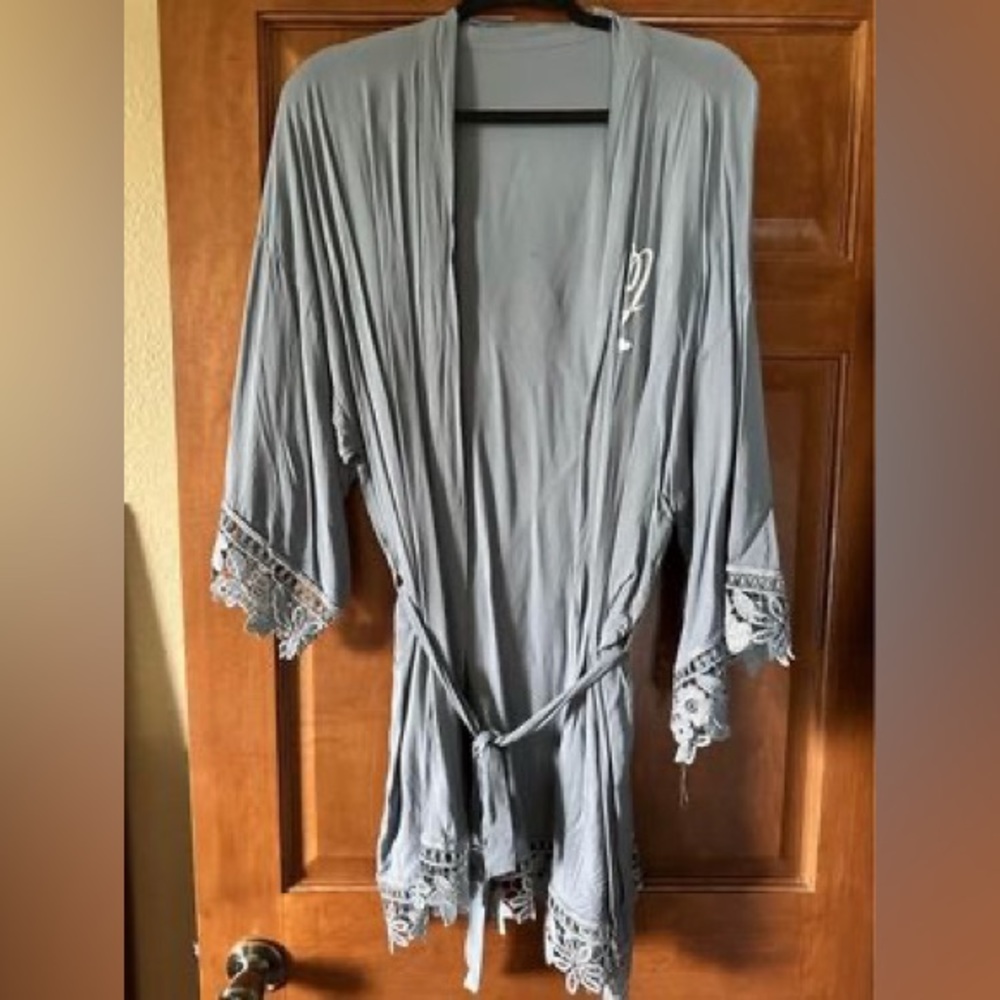 Light Blue Robe with “J” on chest.